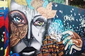 Graffitti Art in Communa 13 Neighborhood By wikipedia