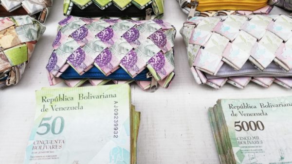Due to hyperinflation, some Venezuelans turn their old currency into art or pass it out on the busses in exchange for coins by Jake Schumacher