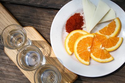 Mezcal with oranges, worm salt and Ozxacan cheese, by Emma Janzen